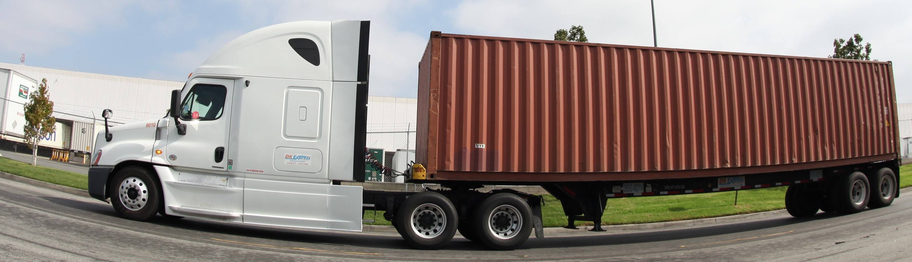 DK Express tractor 8010 hauling a 40-foot container